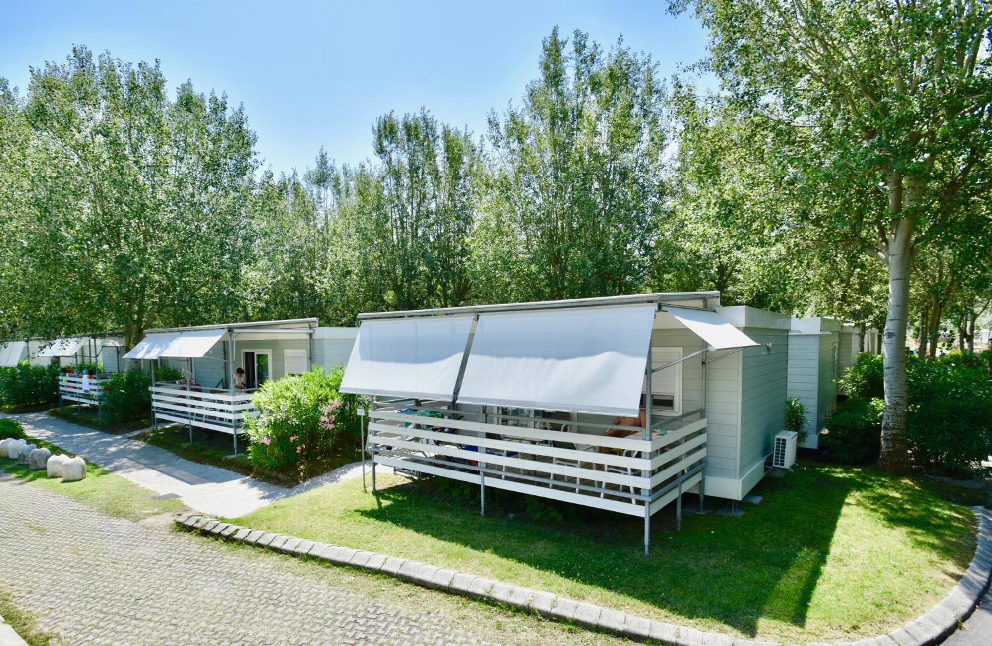 Isamar Holiday Village Ca Lino Extérieur photo Mobile homes in a campsite