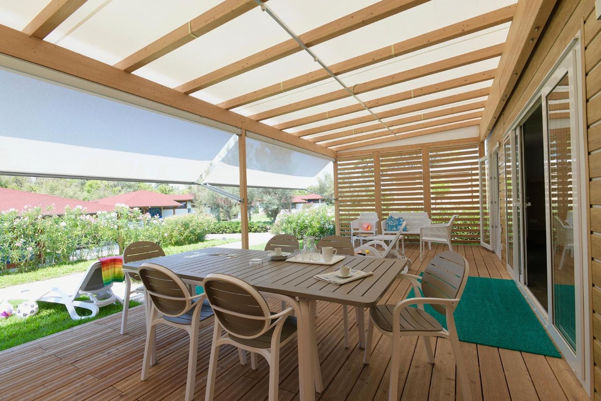 Isamar Holiday Village Ca Lino Chambre photo A pergola with a retractable awning